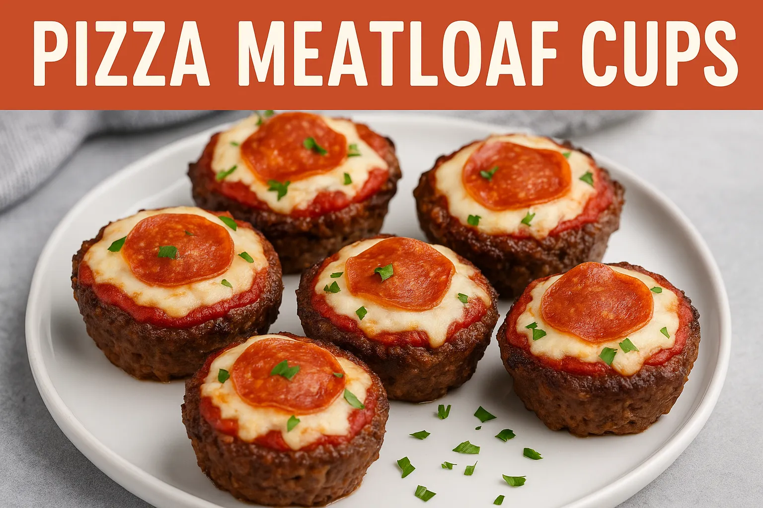 Pizza Meatloaf Cups topped with melted mozzarella, pizza sauce, and pepperoni on a white plate.